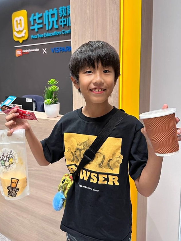 BBT o Student happy with his BBT! They get to bring home the boba they made as well!