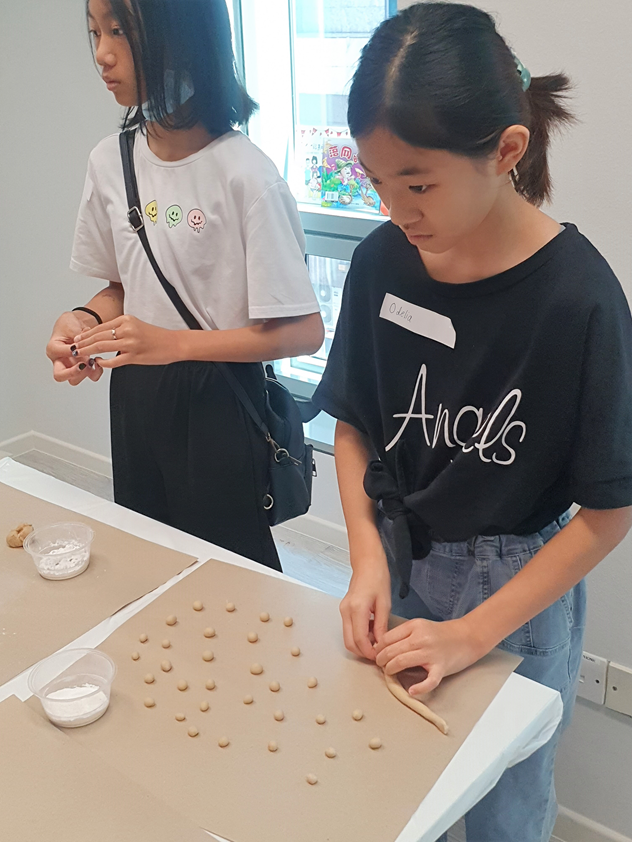 Students making their own boba with the dough