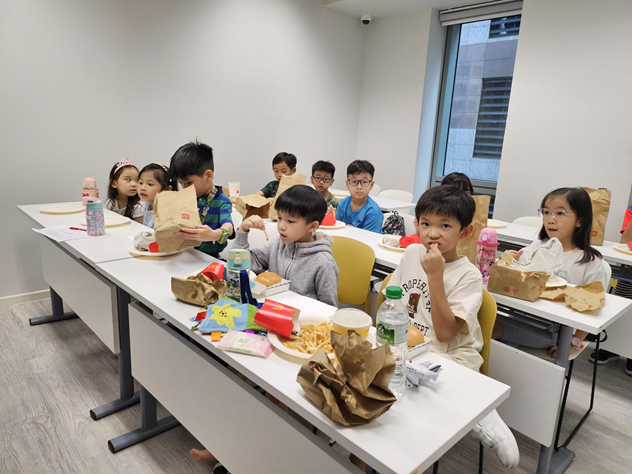 Enjoying their food before movie starts